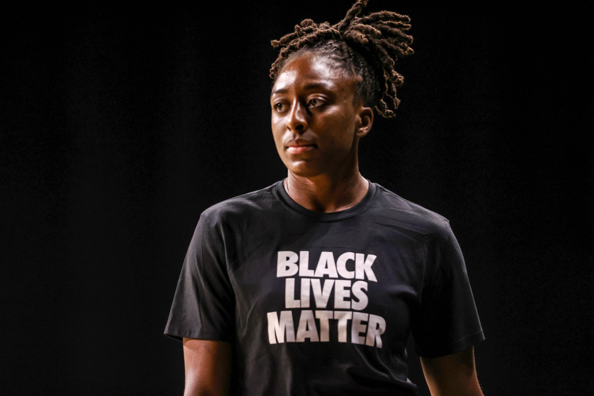 Nneka Ogwumike wearing a Black Lives Matter T-shirt