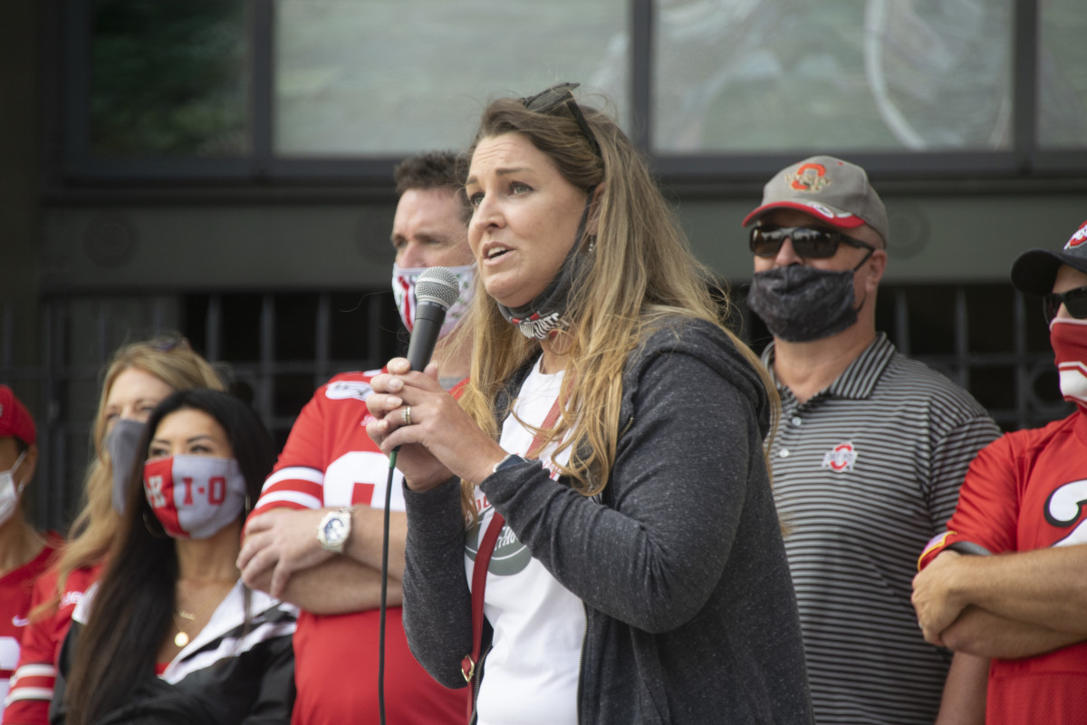 Amanda Babb addresses a crowd of more than 100 Ohio State football fans