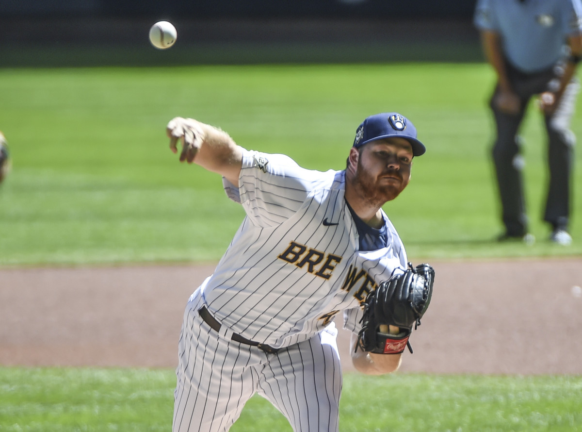 Brandon Woodruff of the Brewers delivers a pitch on Sunday. (Photo by Benny Sieu/USA TODAY Sports)