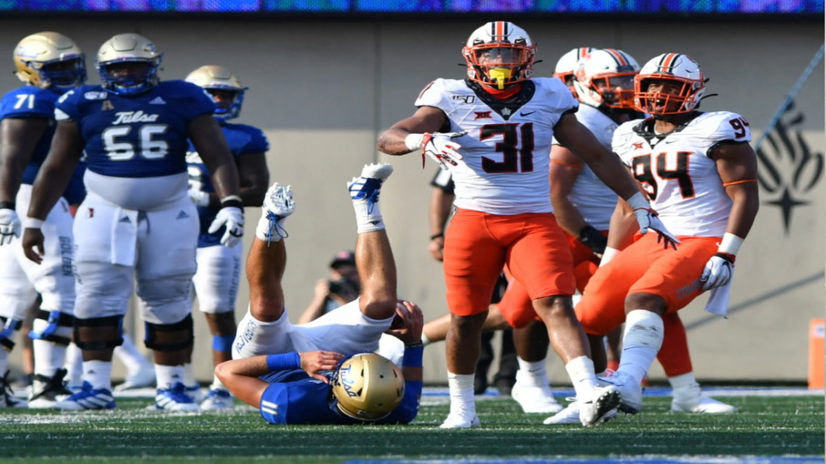 Kolby Harvell-Peel celebrated a sack of Tulsa quarterback Zach Smith that helped clinch the win at Tulsa in game three of 2019.