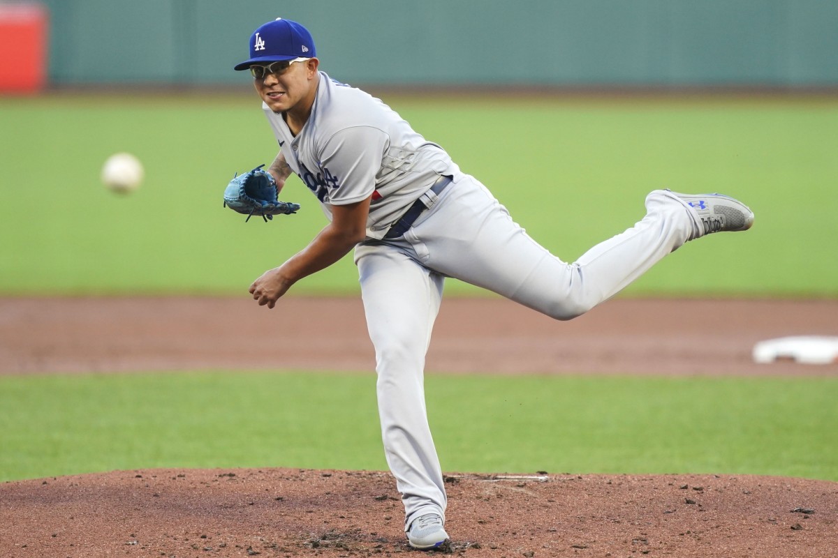 August 25, 2020; San Francisco, California, USA; Los Angeles Dodgers starting pitcher Julio Urias (7) delivers a pitch against the San Francisco Giants during the first inning at Oracle Park. Mandatory Credit: Kyle Terada-USA TODAY Sports
