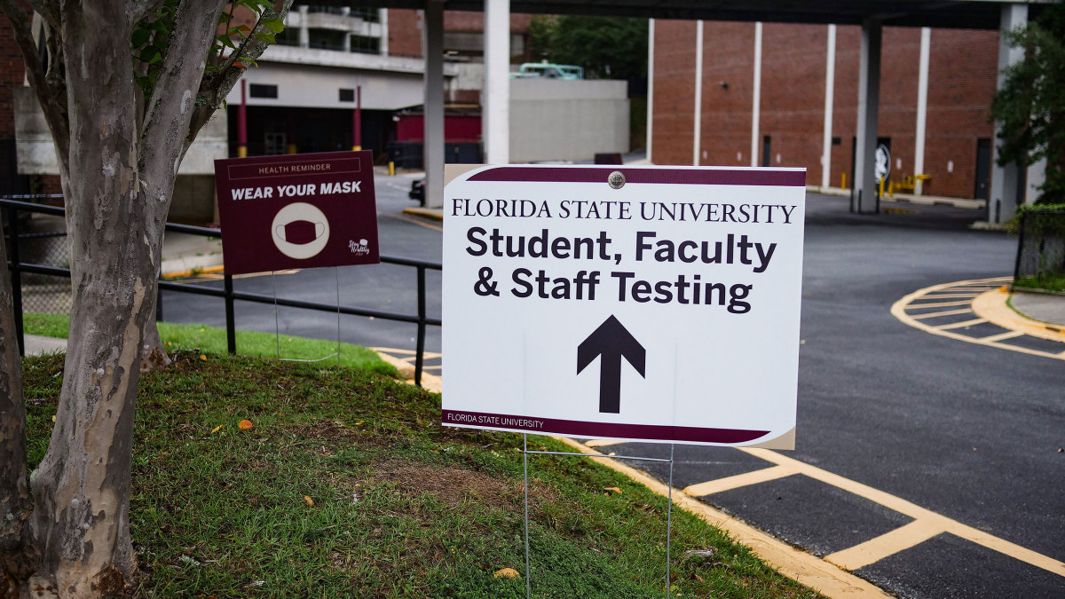 A sign for COVID-19 testing on FSU's campus