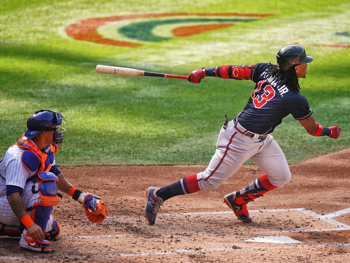 Ronald Acuña Jr. swings a bat