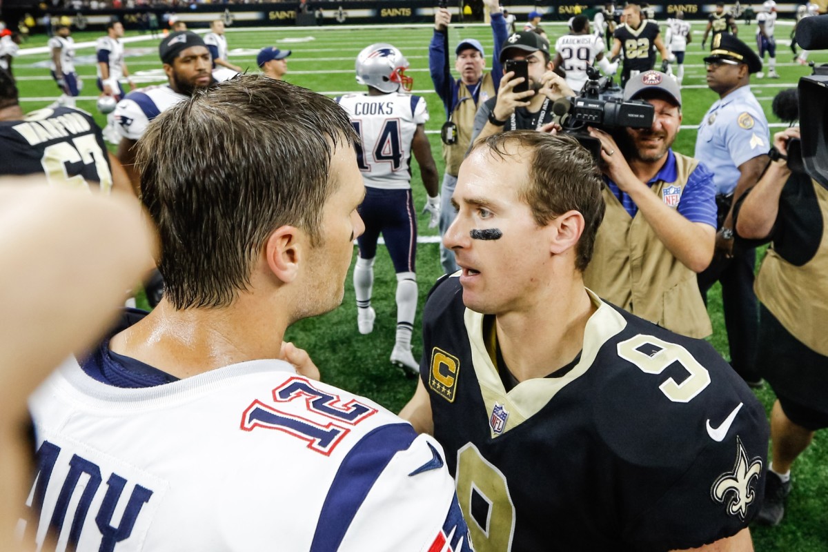 Sep 17, 2017; New Orleans, LA, USA; New Orleans Saints quarterback Drew Brees (9) talks to New England Patriots quarterback Tom Brady (12) following a game at the Mercedes-Benz Superdome. The Patriots defeated the Saints 36-20. Mandatory Credit: Derick E. Hingle-USA TODAY Sports