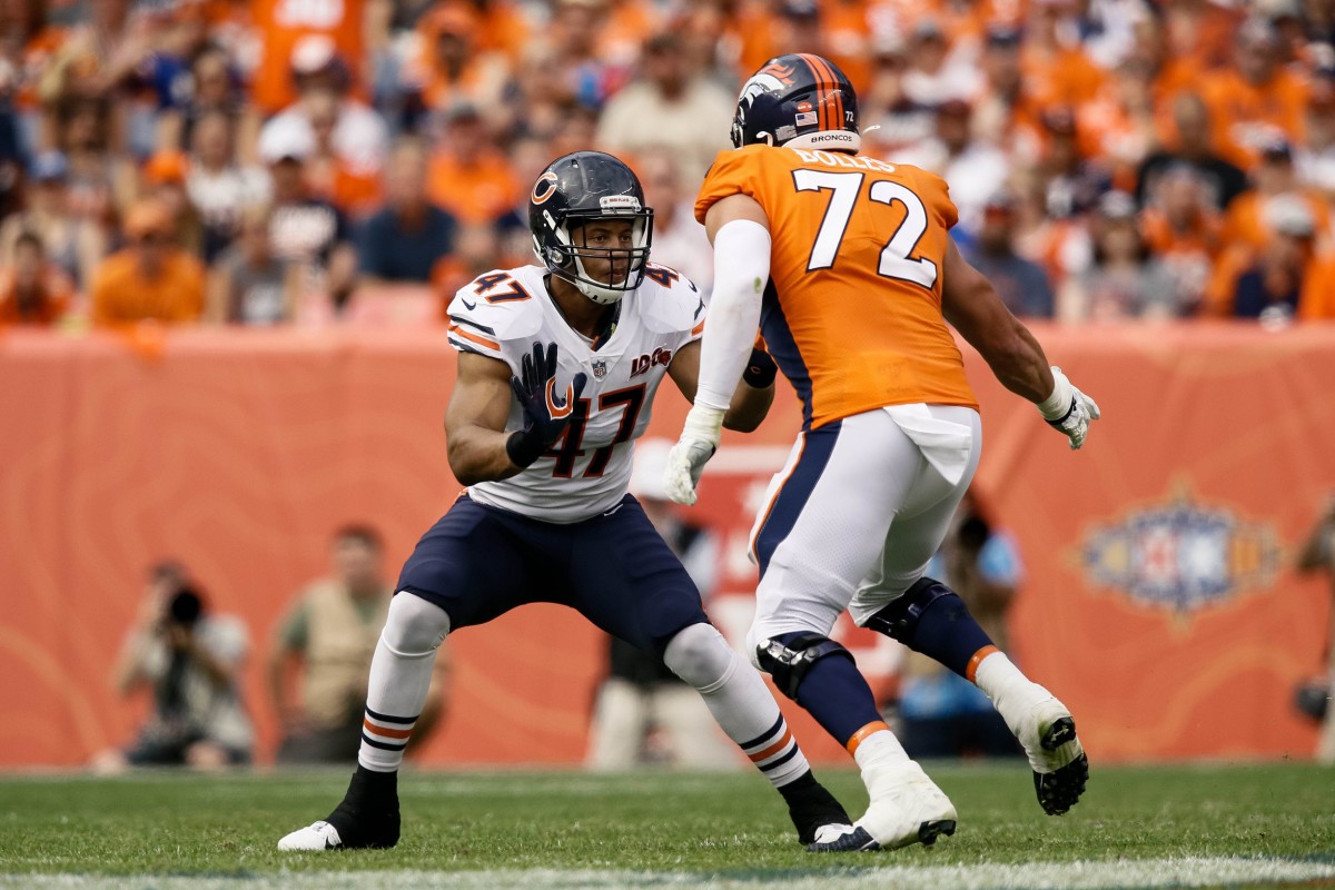 Chicago Bears linebacker Isaiah Irving (47) defends against Denver Broncos offensive tackle Garett Bolles (72) in the second quarter at Empower Field at Mile High.
