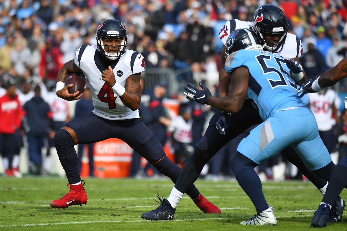 Dec 15, 2019; Nashville, TN, USA; Houston Texans quarterback Deshaun Watson (4) scrambles out of the pocket during the first half against the Tennessee Titans at Nissan Stadium. Mandatory Credit: Christopher Hanewinckel-USA TODAY Sports