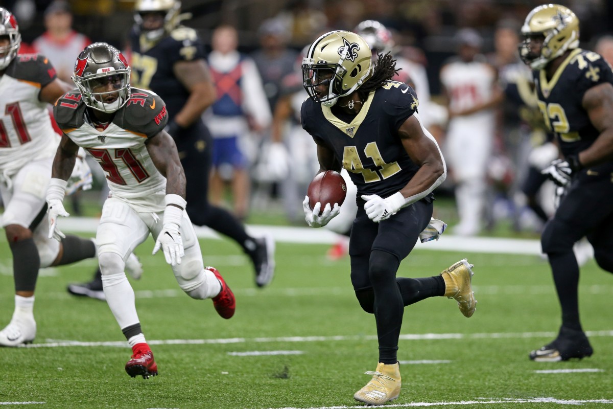 Oct 6, 2019; New Orleans, LA, USA; New Orleans Saints running back Alvin Kamara (41) runs the ball against Tampa Bay Buccaneers free safety Jordan Whitehead (31) in the second half at the Mercedes-Benz Superdome. Mandatory Credit: Chuck Cook-USA TODAY
