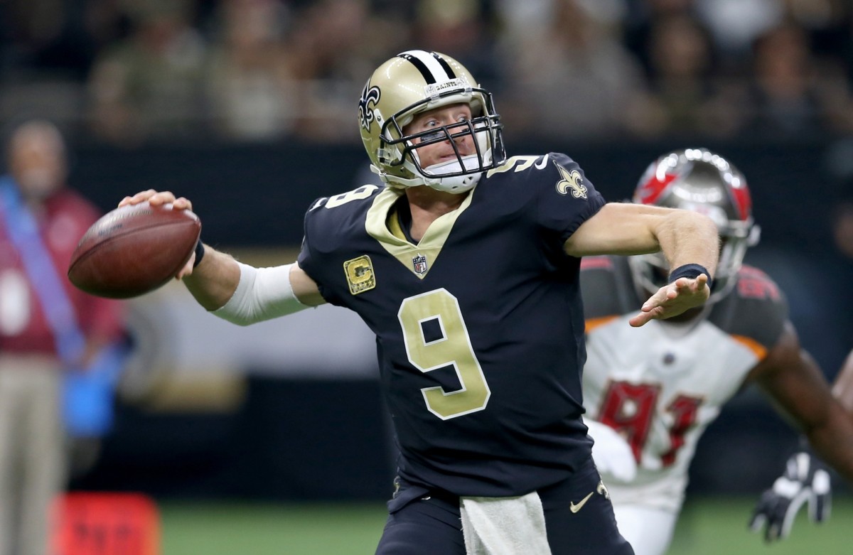 Nov 5, 2017; New Orleans, LA, USA; New Orleans Saints quarterback Drew Brees (9) looks to throw against the Tampa Bay Buccaneers in the second quarter at the Mercedes-Benz Superdome. Mandatory Credit: Chuck Cook-USA TODAY