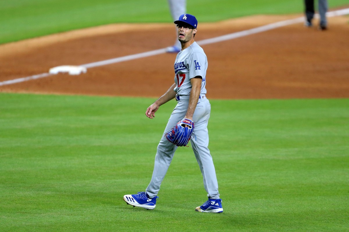 Jul 28, 2020; Houston, Texas, USA; Los Angeles Dodgers relief pitcher Joe Kelly (17) shouts at Houston Astros shortstop Carlos Correa (1, not shown) after a strikeout during the sixth inning at Minute Maid Park. Mandatory Credit: Erik Williams-USA TODAY Sports
