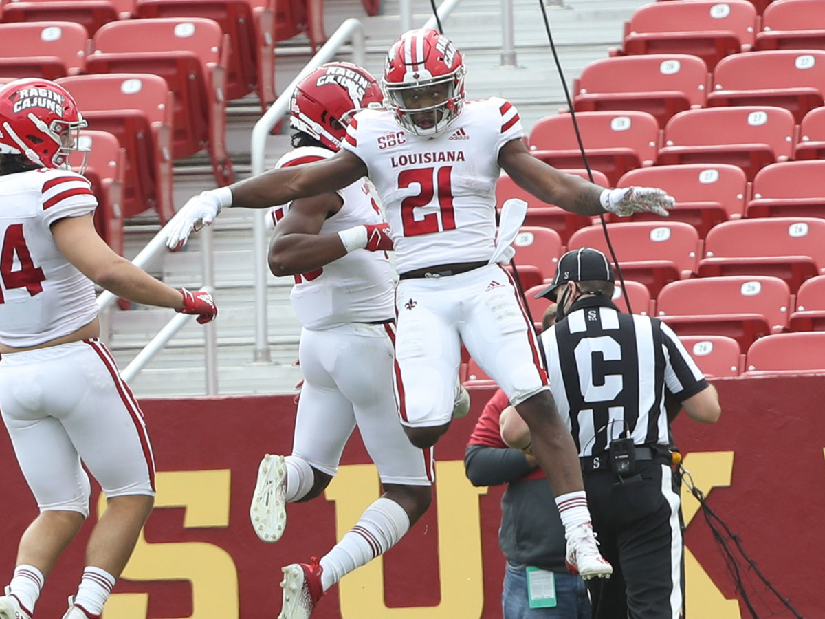 Louisiana celebrates during an upset win over Iowa State