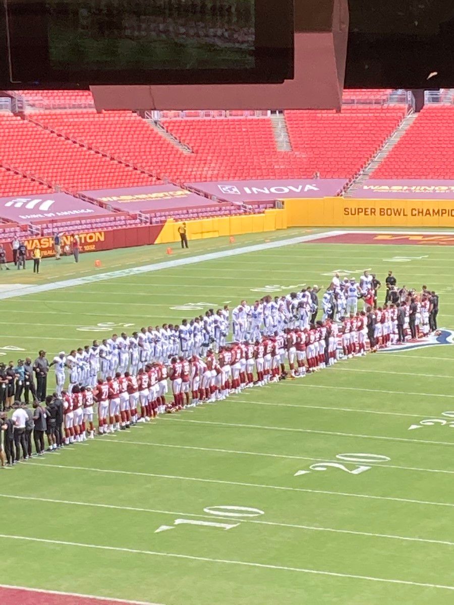 Team unity moment prior to Eagles game against Washington
