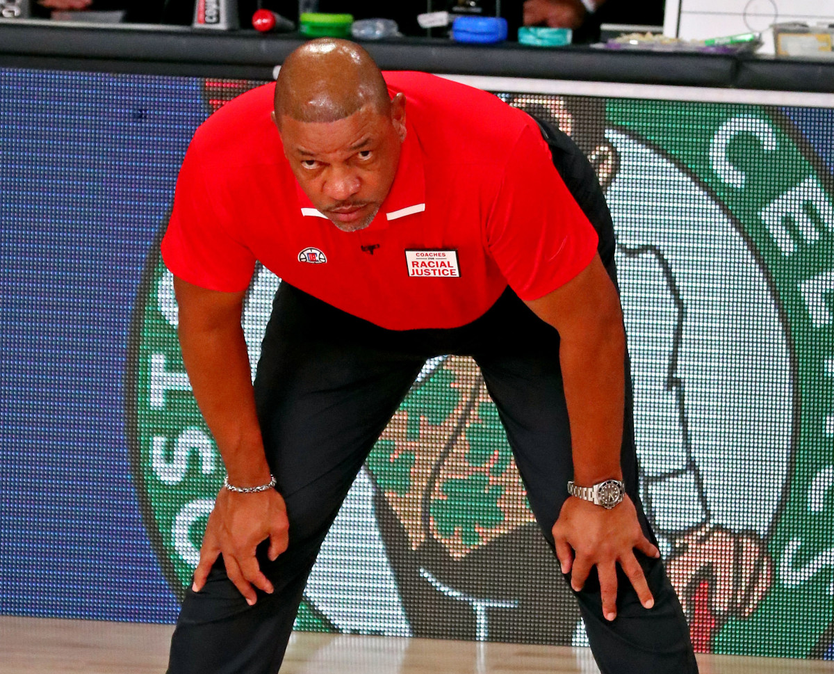 Doc Rivers puts his hands on his knees
