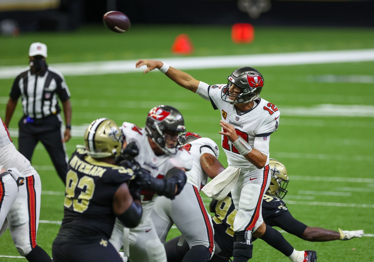 Sep 13, 2020; New Orleans, Louisiana, USA; Tampa Bay Buccaneers quarterback Tom Brady (12) passes against the New Orleans Saints during the fourth quarter at the Mercedes-Benz Superdome. Mandatory Credit: Derick E. Hingle-USA TODAY