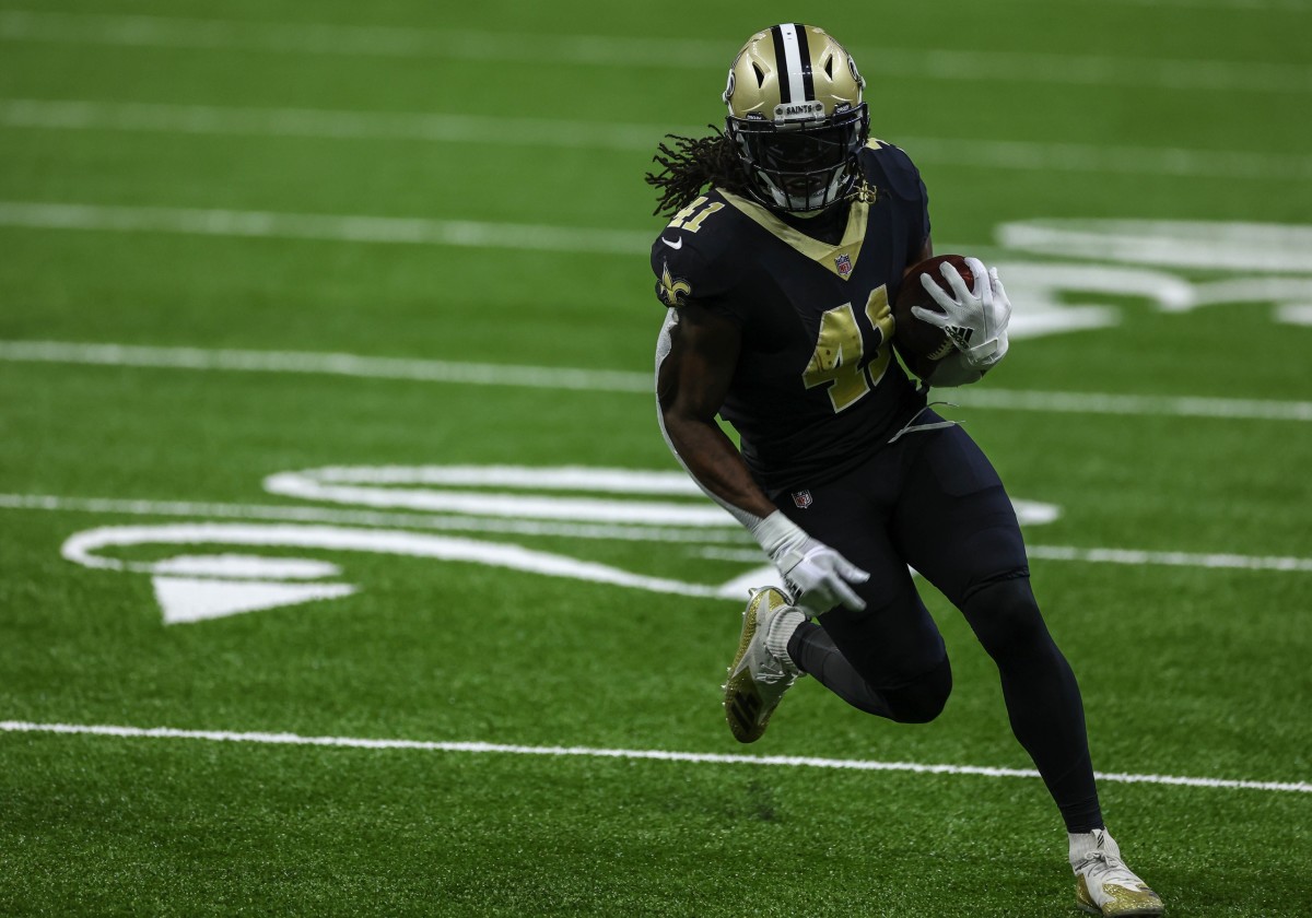 Sep 13, 2020; New Orleans, Louisiana, USA; New Orleans Saints running back Alvin Kamara (41) catches and runs for a touchdown against the Tampa Bay Buccaneers during the first quarter at the Mercedes-Benz Superdome. Mandatory Credit: Derick E. Hingle-USA TODAY