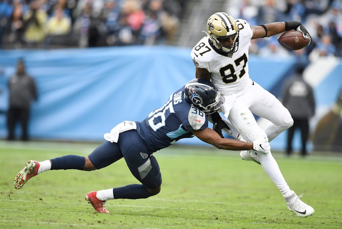 New Orleans Saints tight end Jared Cook (87) breaks away fro Tennessee Titans cornerback LeShaun Sims (36) for a touchdown during the second quarter at Nissan Stadium Sunday, Dec. 22, 2019 in Nashville, Tenn. © George Walker IV / Tennessean.com, Nashville Tennessean via Imagn Content Services, LLC
