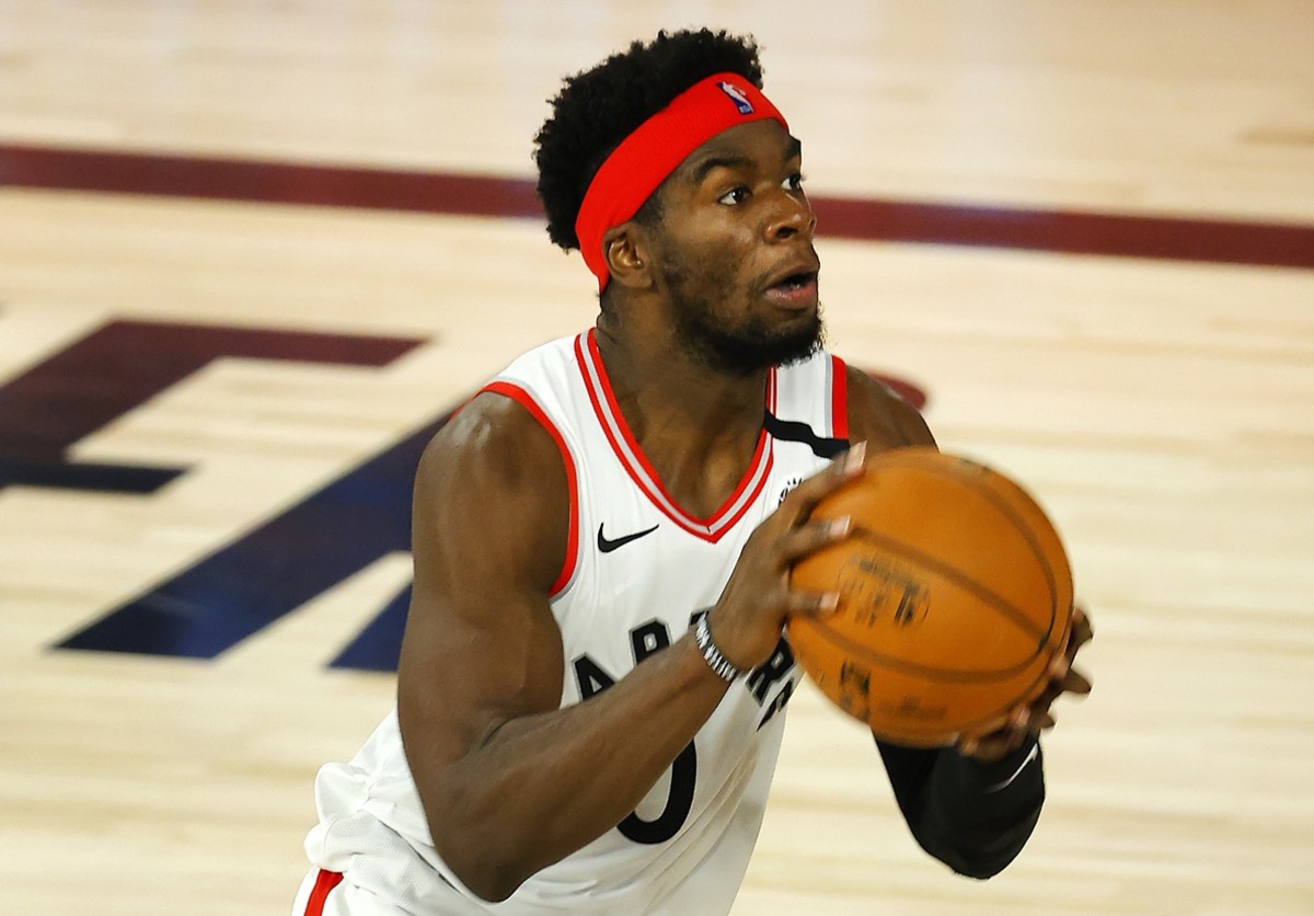 Terence Davis #0 of the Toronto Raptors handles the ball during the third quarter against the Denver Nuggets at The Field House at ESPN Wide World Of Sports Complex on August 14, 2020 in Lake Buena Vista, Florida. Mandatory Credit: Mike Ehrmann/Pool Photo-USA TODAY Sports