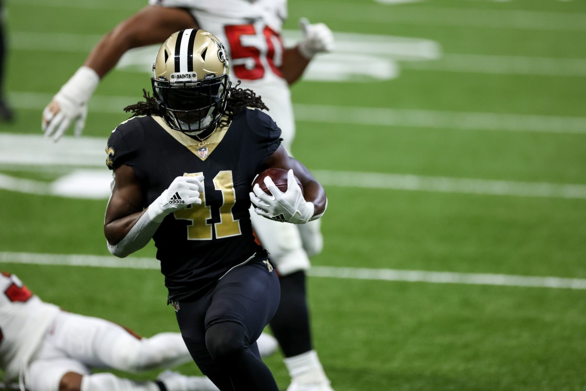 Sep 13, 2020; New Orleans, Louisiana, USA; New Orleans Saints running back Alvin Kamara (41) scores against the Tampa Bay Buccaneers during the second quarter at the Mercedes-Benz Superdome. Mandatory Credit: Derick E. Hingle-USA TODAY