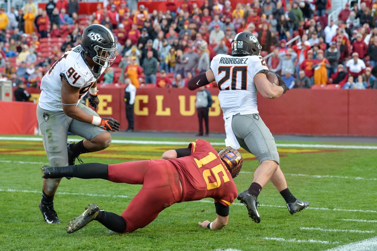 Malcolm Rodriguez gets a block from Trace Ford on his way into the end zone at Iowa State for the game winner.
