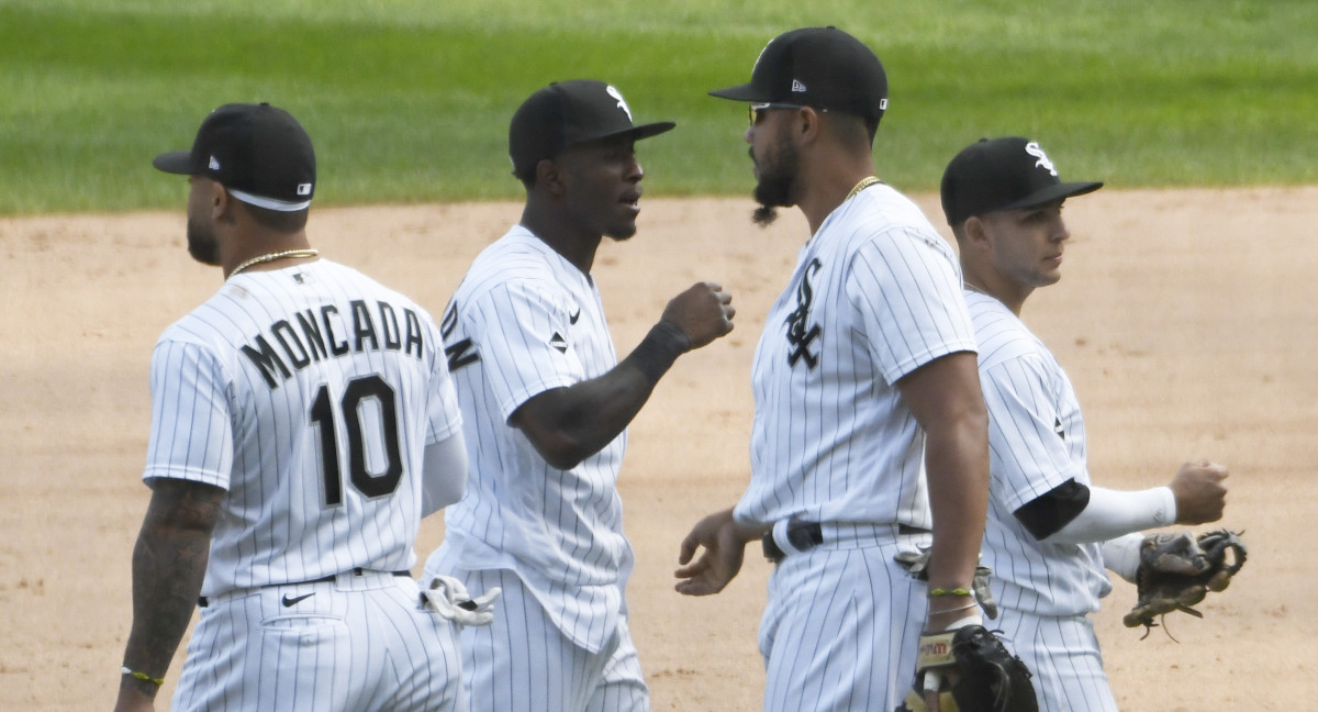 The Chicago White Sox celebrate after defeating the Minnesota Twins at Guaranteed Rate Field to clinch a playoff berth.