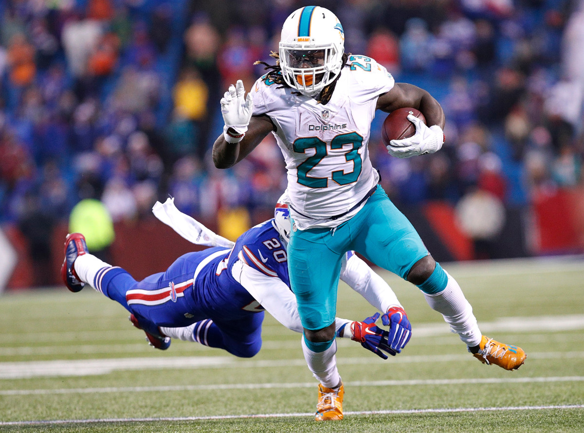 Running back Jay Ajayi (23) eludes a tackle during the second half at New Era Field in a 2016 overtime loss to the Bills. Ajayi is the last Dolphins player to rush for 1,000 yards in a season.