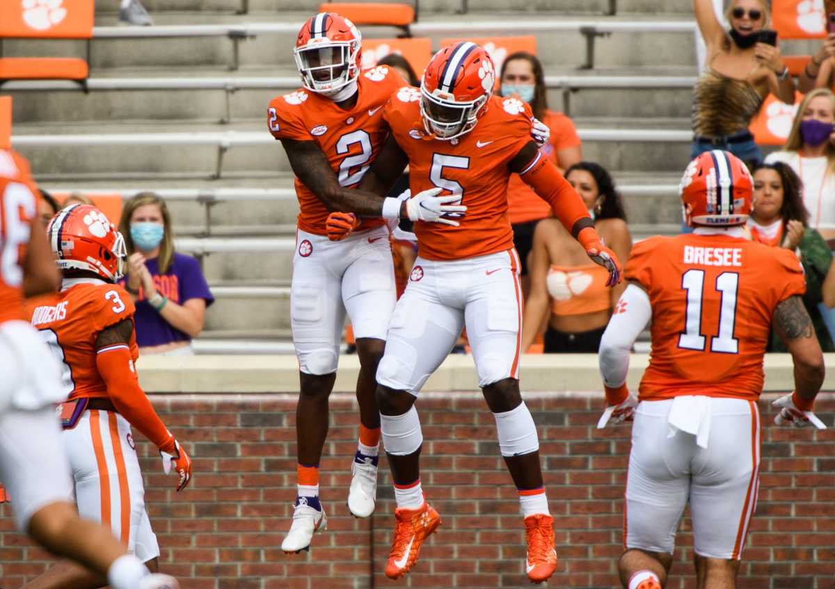 Clemson wide receiver Frank Ladson Jr. (2) and K.J. Henry(5) celebrate during their game Saturday, Sept. 19, 2020