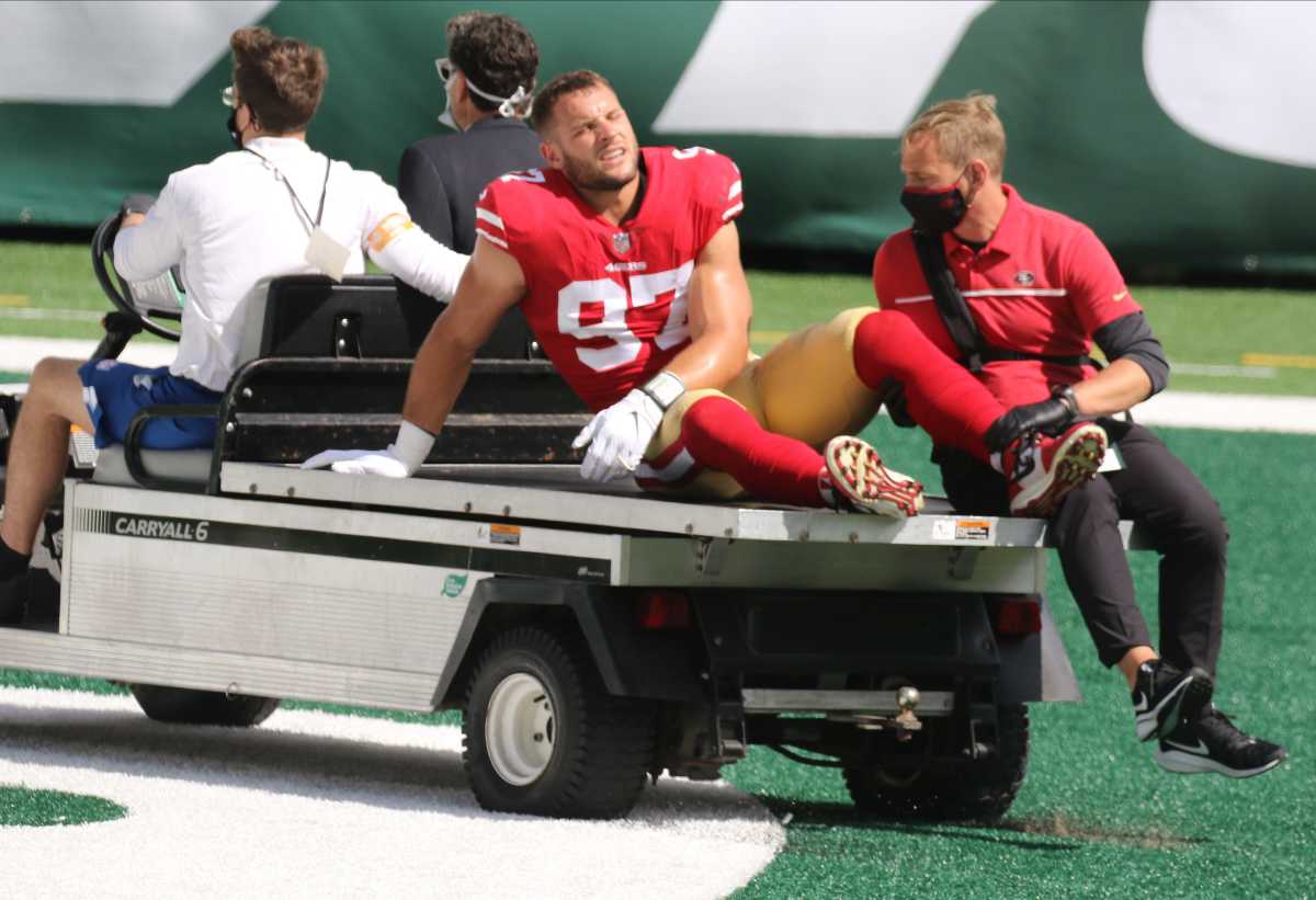 An injured Nick Bosa of the 49ers is carted off the field in the first half as the San Francisco 49ers played New York Jets at MetLife Stadium in East Rutherford, NJ on September 20, 2020. The San Francisco 49ers Vs New York Jets At Metlife Stadium In East Rutherford Nj On September 20 2020