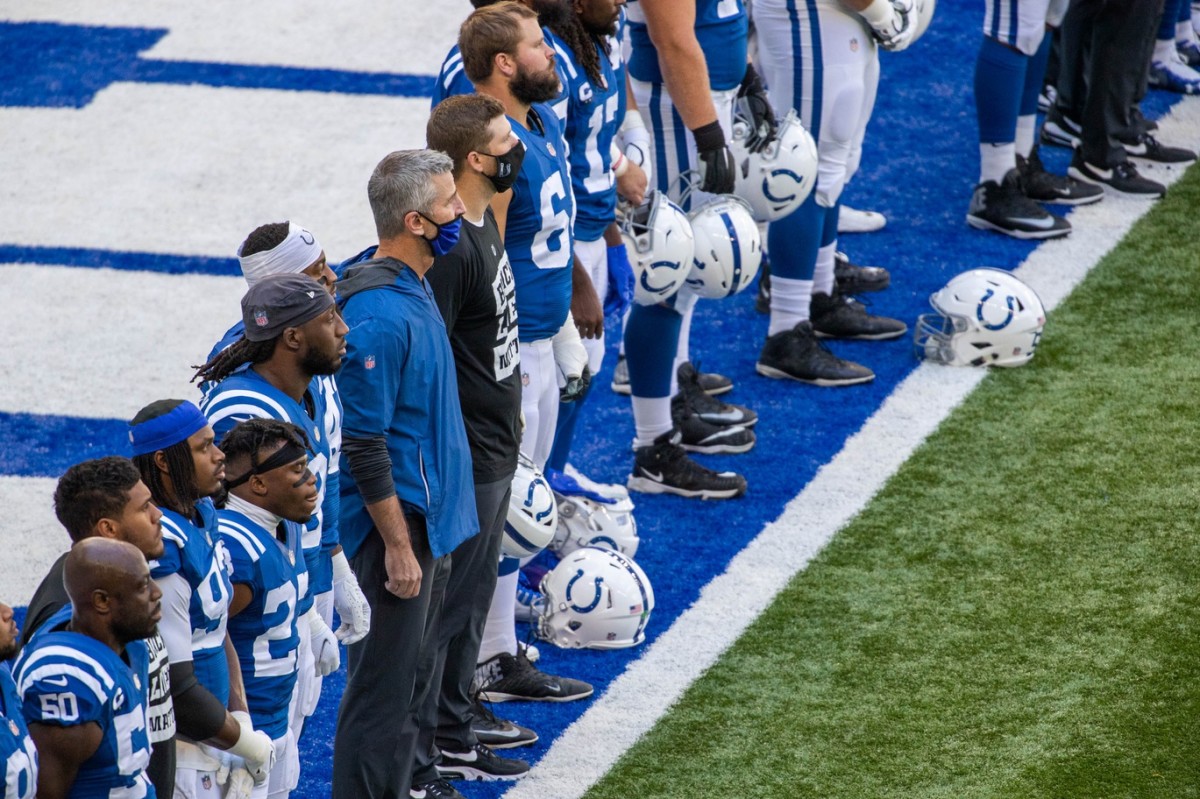 Indianapolis Colts head coach Frank Reich (blue jacket) wore a different mask for a Week 2 home game against Minnesota at Lucas Oil Stadium.