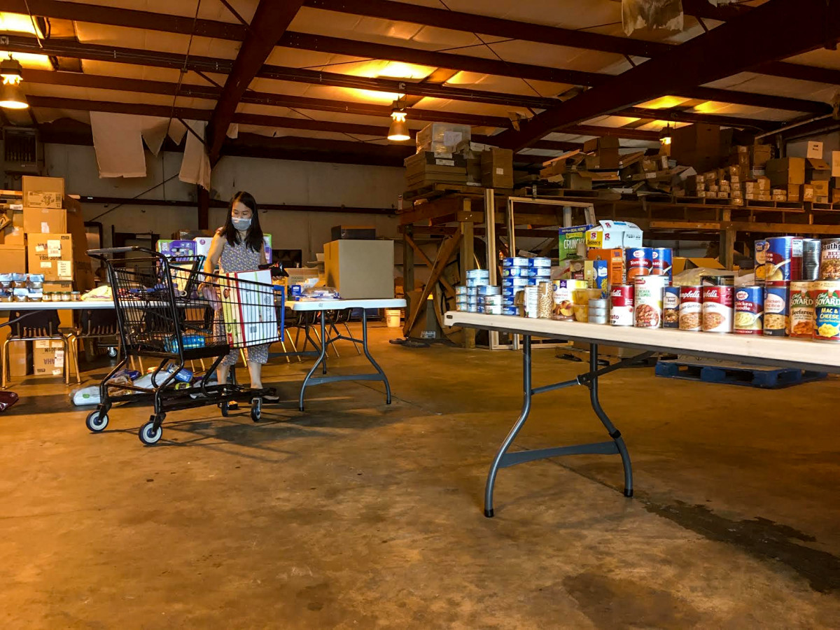 McNeese cleared out a warehouse on campus to house donations. This past Tuesday, a woman shops for items.