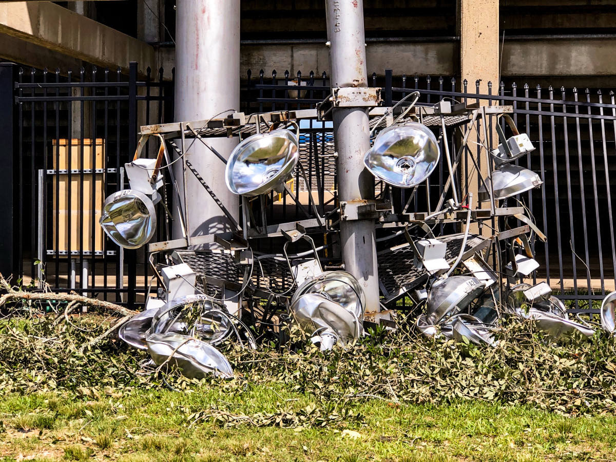 A crushed light fixture outside Cowboy Stadium