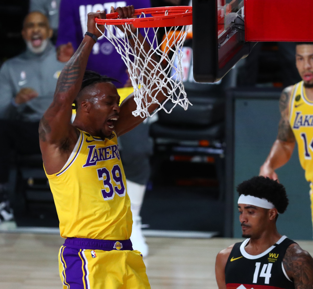 Los Angeles Lakers center Dwight Howard (39) dunks the ball against the Denver Nuggets during the first half in game four of the Western Conference Finals of the 2020 NBA Playoffs