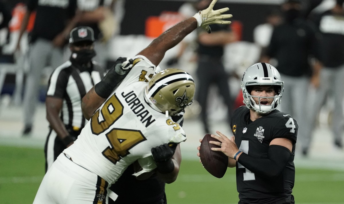 Sep 21, 2020; Paradise, Nevada, USA; Las Vegas Raiders quarterback Derek Carr (4) throws a pass against the New Orleans Saints during the second quarter of a NFL game at Allegiant Stadium. Mandatory Credit: Kirby Lee-USA TODAY