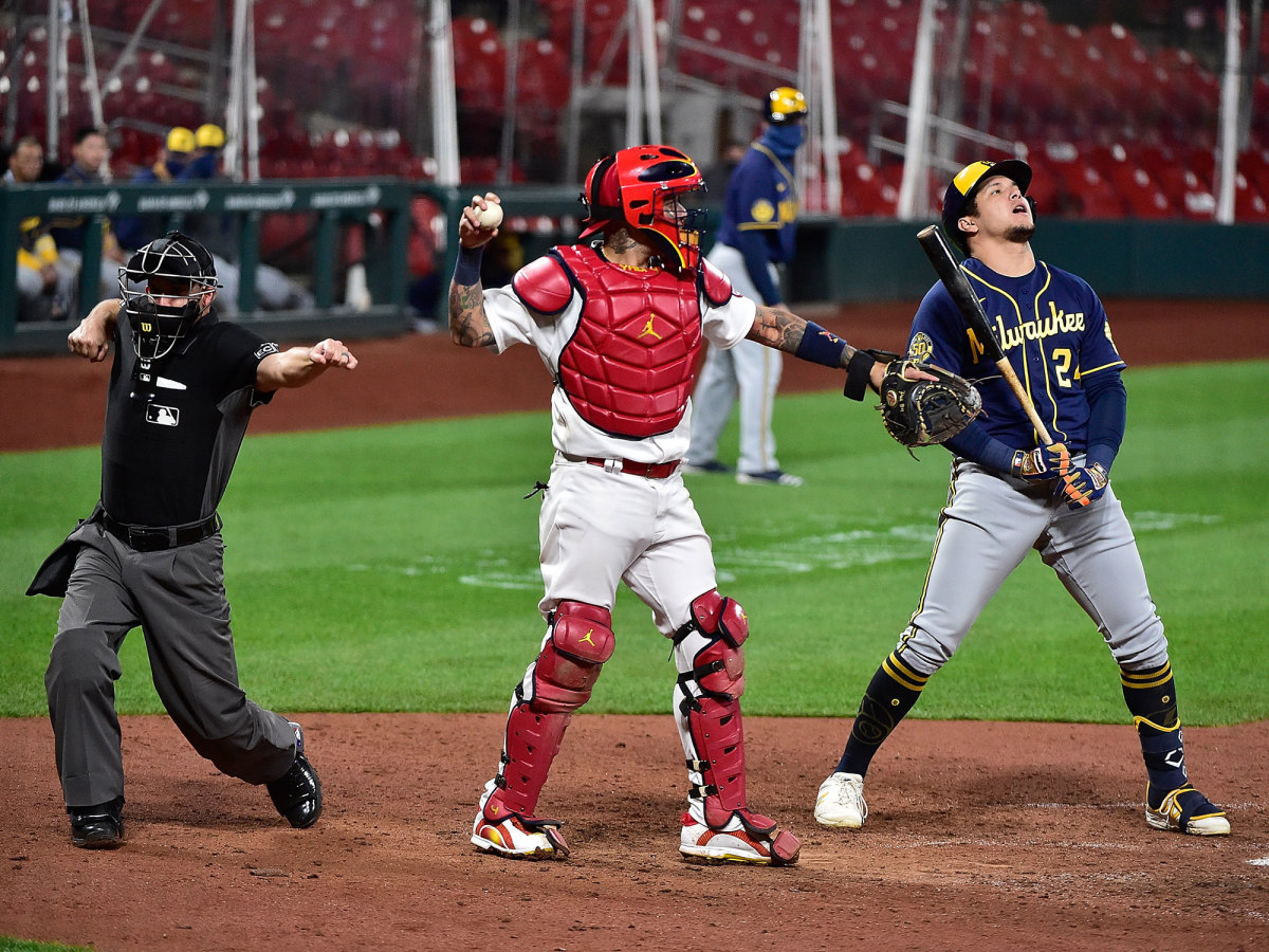 A Brewers batter strikes out looking