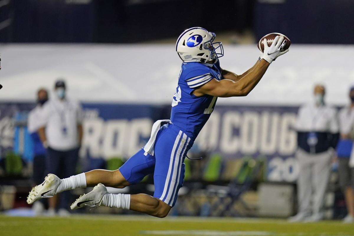 BYU wide-receiver Gunner Romney dives to make a catch on the 1-yard line against Troy