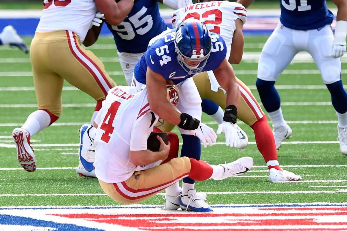 New York Giants linebacker Blake Martinez (54) sacks San Francisco 49ers quarterback Nick Mullens (4) in the first quarter. The Giants face the 49ers in an NFL game at MetLife Stadium on Sunday, Sept. 27, 2020, in East Rutherford. Giants 49ers