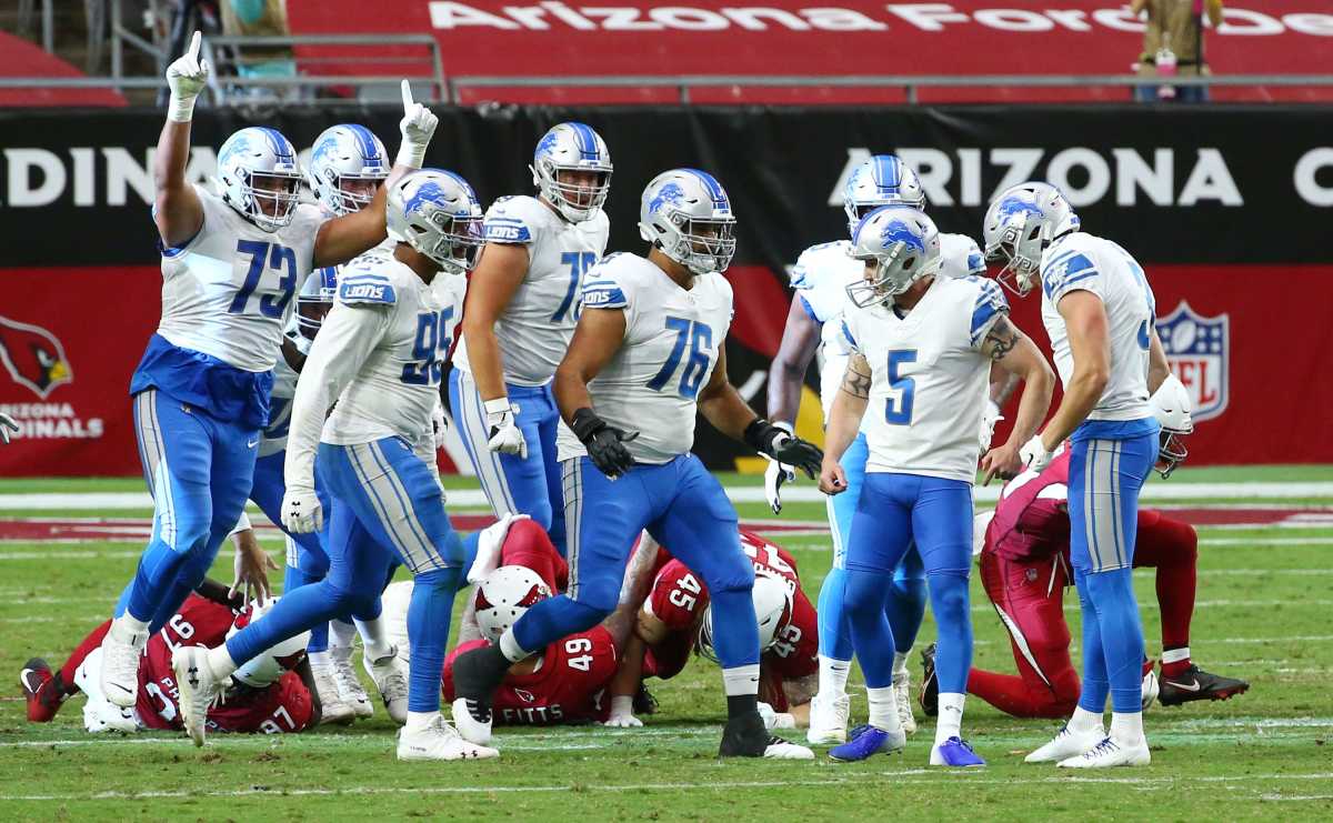 Detroit Lions kicker Matt Prater (5) celebrates his game winning field goal against the Arizona Cardinals with no time left on the clock at State Farm Stadium.