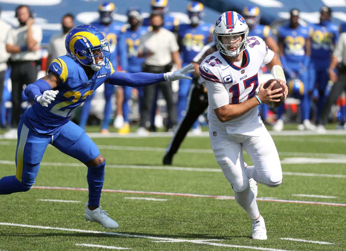 Bills quarterback Josh Allen escapes pressure from Rams Troy Hill