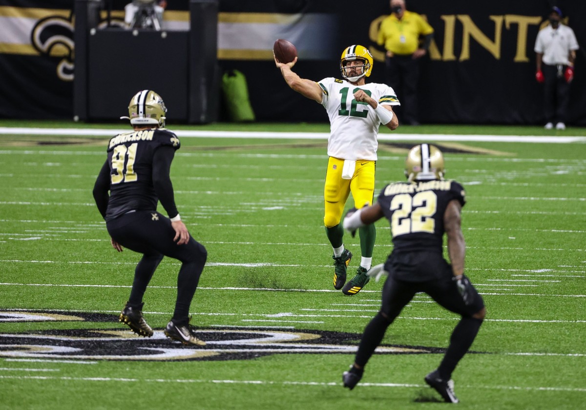 Sep 27, 2020; New Orleans, Louisiana, USA; Green Bay Packers quarterback Aaron Rodgers (12) throws against the New Orleans Saints during the second quarter at the Mercedes-Benz Superdome. Mandatory Credit: Derick E. Hingle-USA TODAY