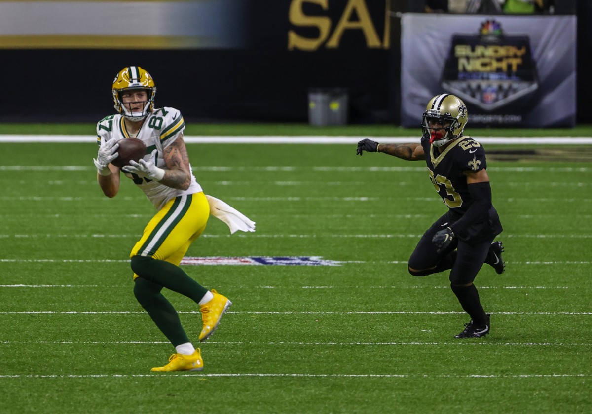 Sep 27, 2020; New Orleans, Louisiana, USA; Green Bay Packers tight end Jace Sternberger (87) catches a pass as New Orleans Saints cornerback Marshon Lattimore (23) defends during the second half at the Mercedes-Benz Superdome. Mandatory Credit: Derick E. Hingle-USA TODAY
