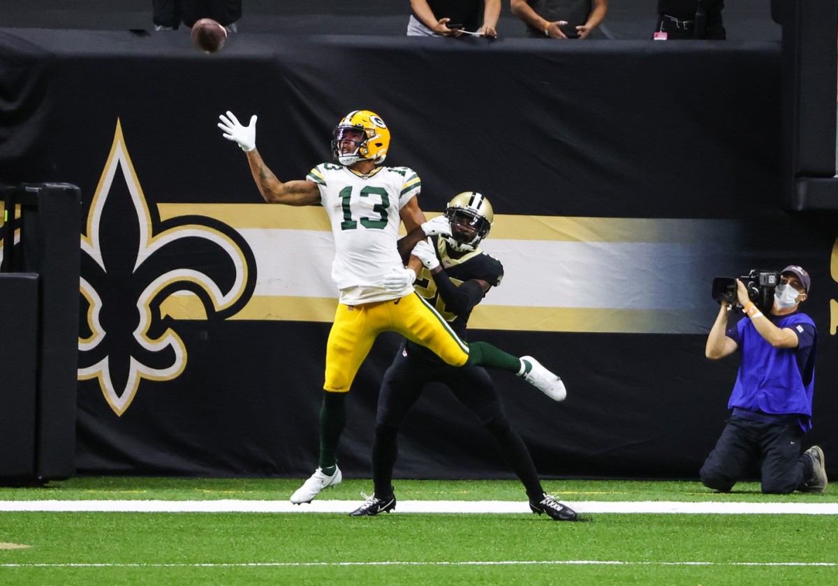 Sep 27, 2020; New Orleans, Louisiana, USA; New Orleans Saints cornerback Janoris Jenkins (20) interferes with Green Bay Packers wide receiver Allen Lazard (13) during the second half at the Mercedes-Benz Superdome. Mandatory Credit: Derick E. Hingle-USA TODAY Sports