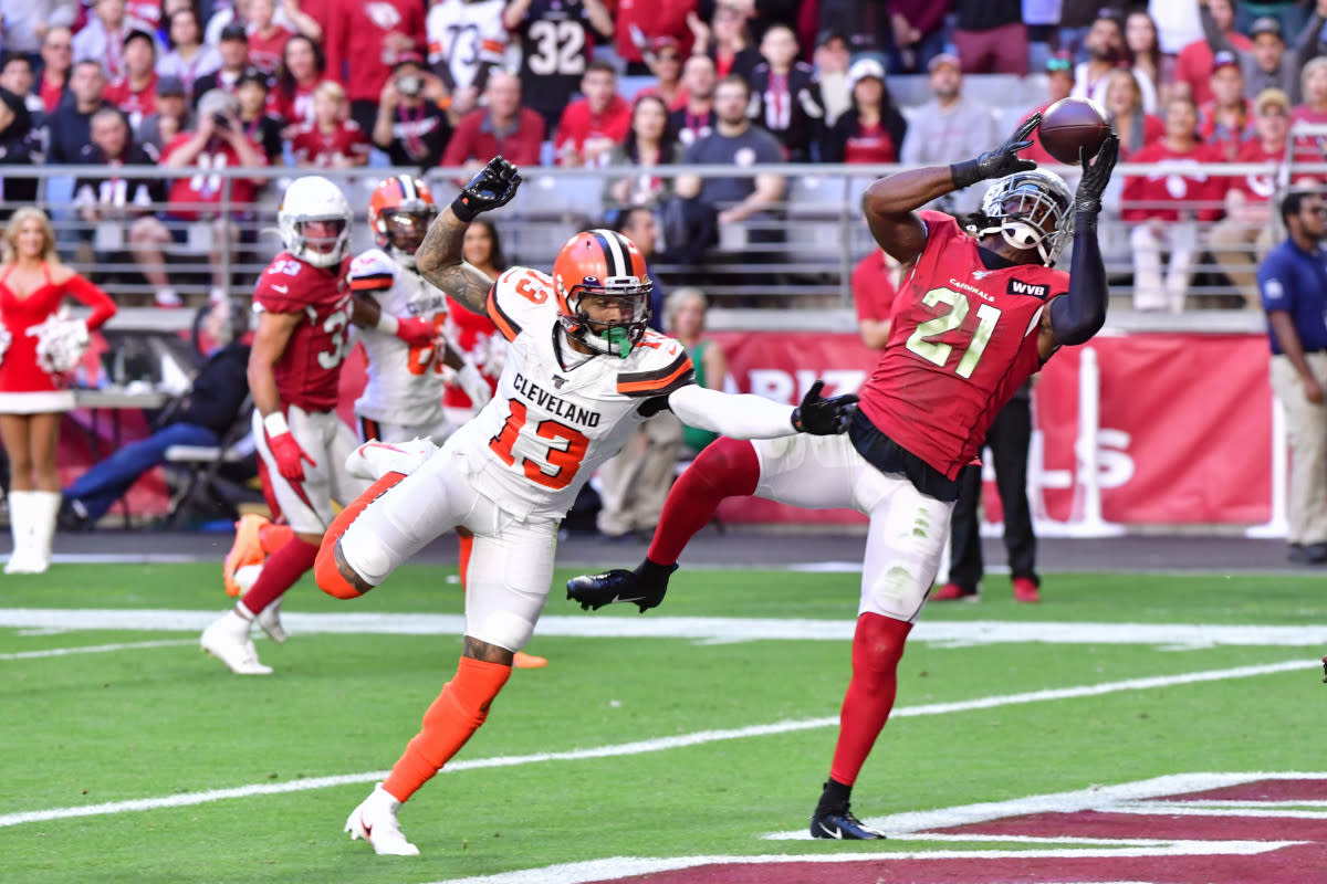 Cardinals cornerback Patrick Peterson (21) intercepts a pass intended for Browns wide receiver Odell Beckham Jr. (13) during a 2019 game at State Farm Stadium.