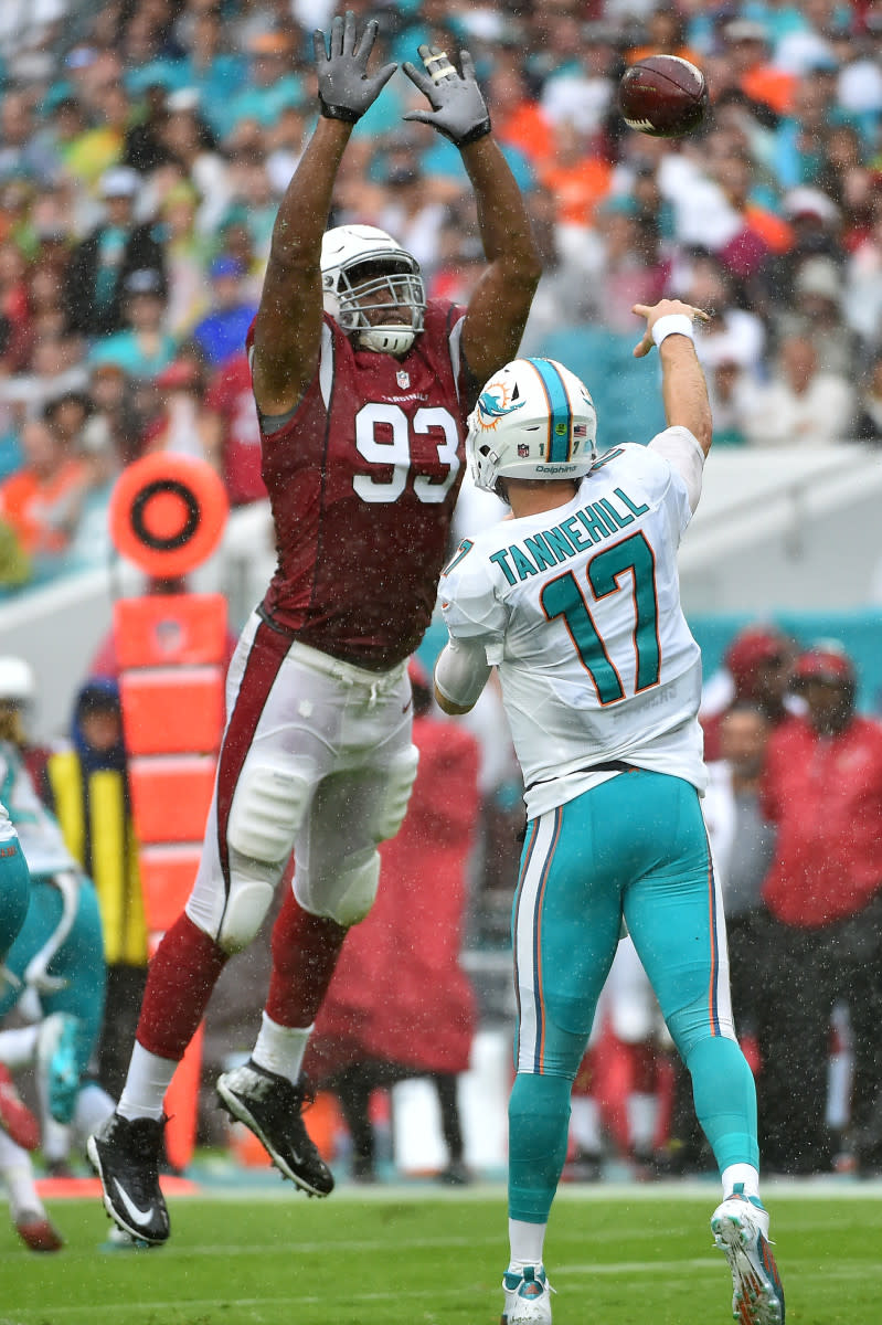 Cardinals defensive end Calais Campbell attempts to block Dolphins quarterback Ryan Tannehill's pass during a 2016 game at Hard Rock Stadium.