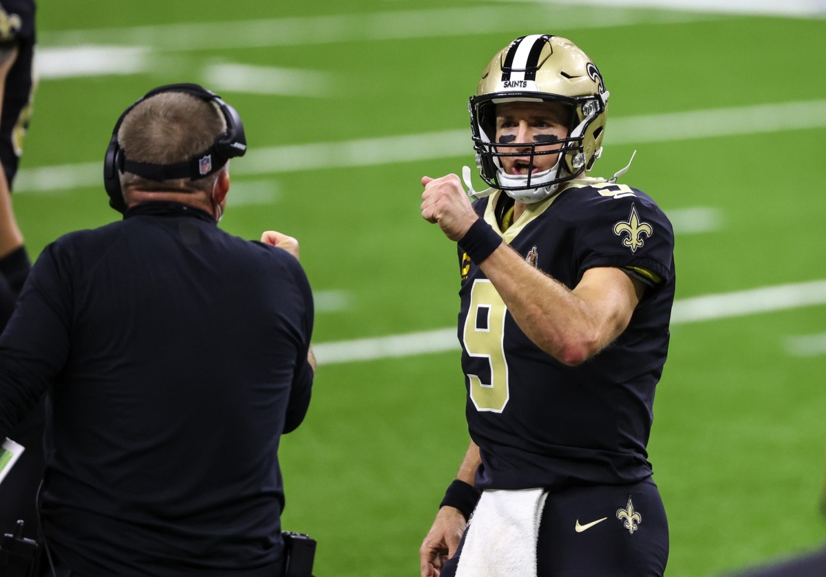 Sep 27, 2020; New Orleans, Louisiana, USA; New Orleans Saints quarterback Drew Brees (9) celebrates with head coach Sean Payton after a touchdown against the Green Bay Packers during the second quarter at the Mercedes-Benz Superdome. Mandatory Credit: Derick E. Hingle-USA TODAY Sports