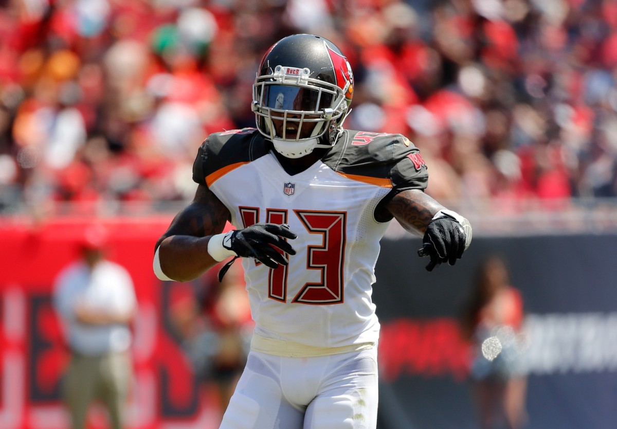 Tampa Bay Buccaneers defensive back T.J. Ward (43) calls a play against the Chicago Bears during the second quarter at Raymond James Stadium.