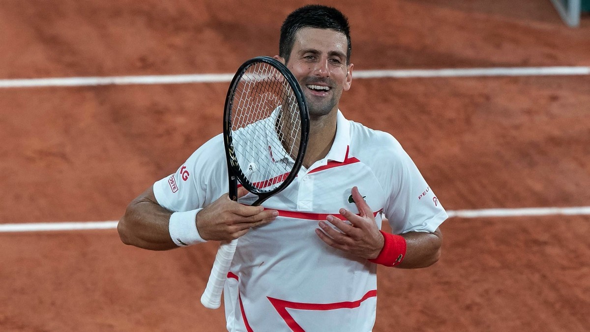 Novak Djokovic (SRB) celebrates recording match point during his match against Mikael Ymer (SWE) on day three at Stade Roland Garros.