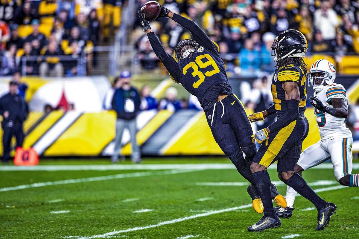 Minkah Fitzpatrick intercepts a pass against the Dolphins during the 2019 season