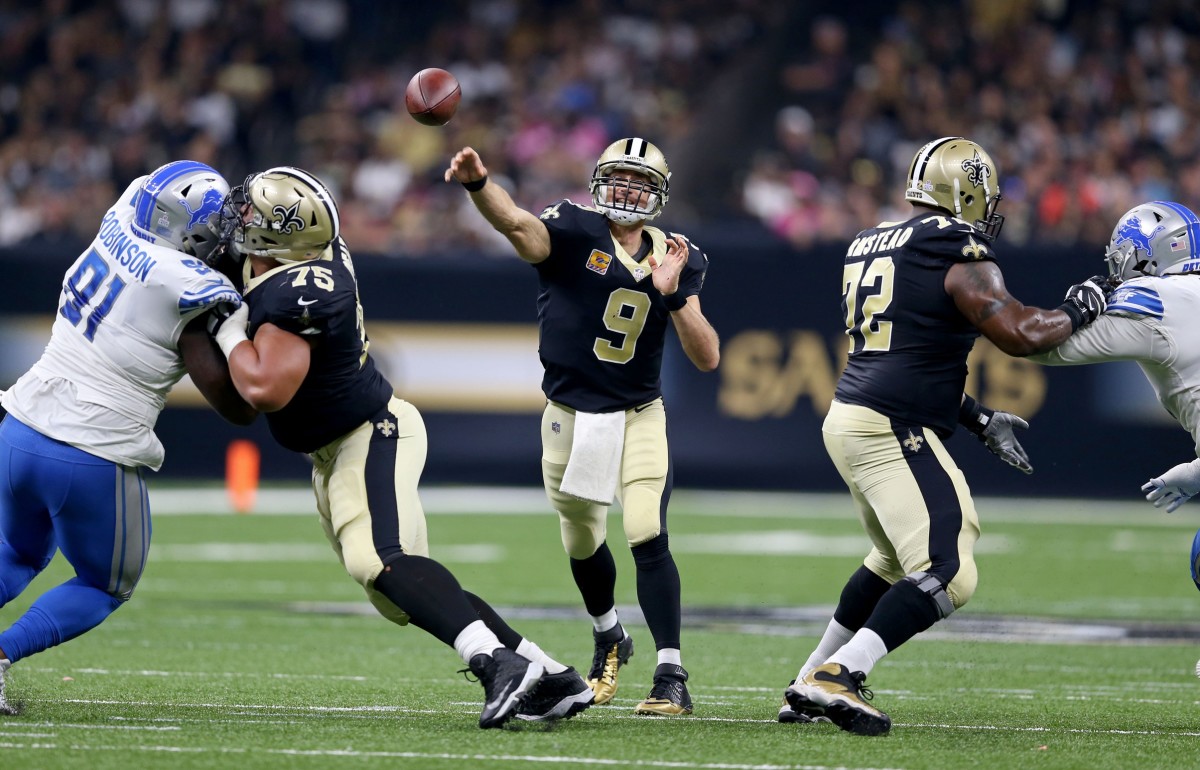 Oct 15, 2017; New Orleans, LA, USA; New Orleans Saints quarterback Drew Brees (9) throws a pass while protected by offensive guard Andrus Peat (75) and offensive tackle Terron Armstead (72) in the first half against the Detroit Lions at the Mercedes-Benz Superdome. Mandatory Credit: Chuck Cook-USA TODAY