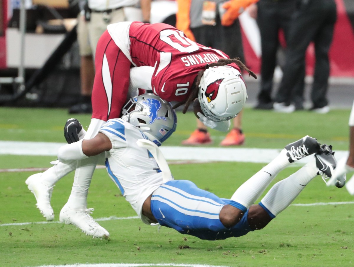 Arizona Cardinals wide receiver DeAndre Hopkins (10) is tackled by Detroit Lions cornerback Jeff Okudah (30) after a catch during the first quarter at State Farm Stadium Sept. 27, 2020. © Michael Chow via Imagn Content Services, LLC