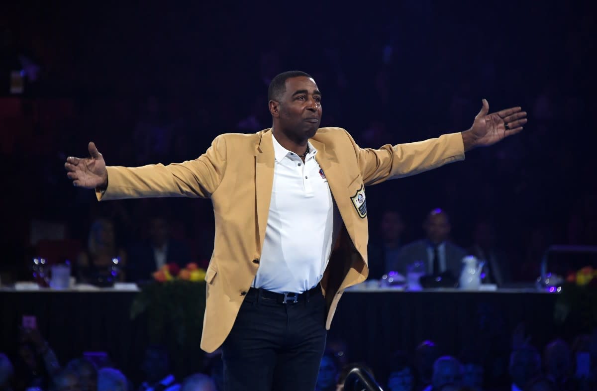 Cris Carter reacts during the Enshrinees Gold Jacket dinner at Memorial Civic Center and Cultural Center.