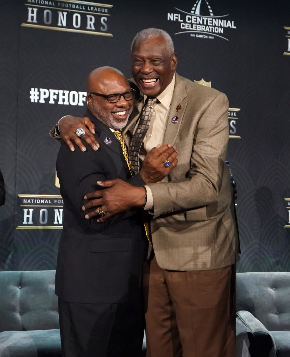Harold Carmichael (right) and Donnie Shell embrace after being selected to the Pro Football Hall of Fame 2020 Centennial Class during the NFL Honors awards presentation at Adrienne Arsht Center.