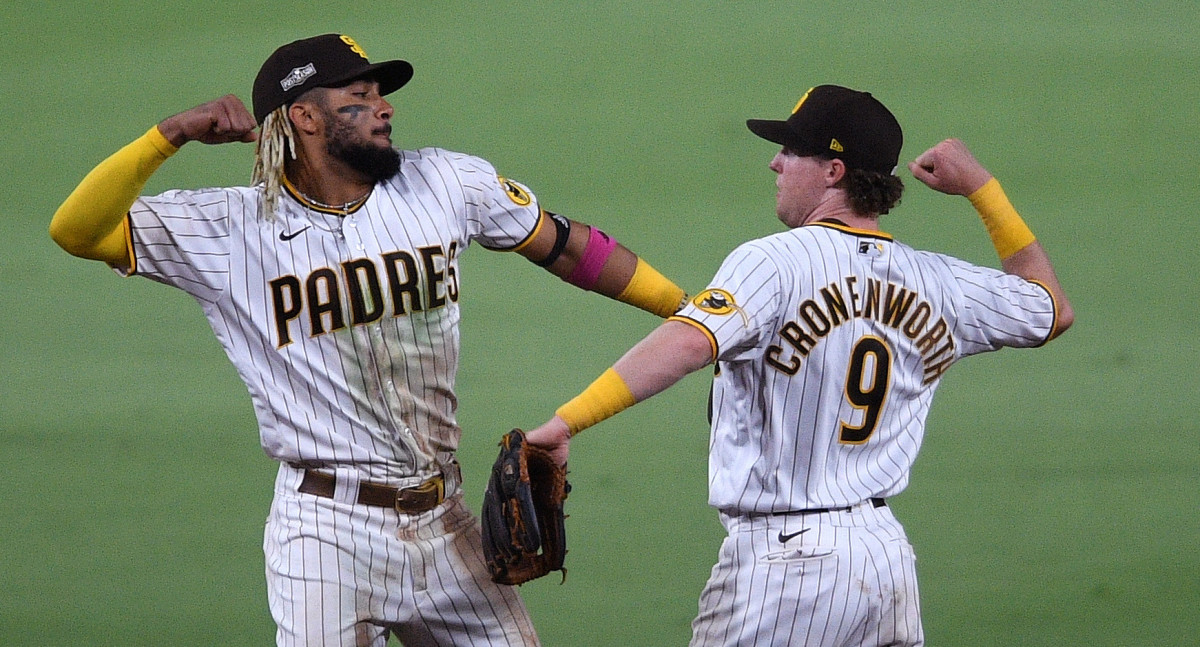 San Diego Padres shortstop Fernando Tatis Jr. (left) and second baseman Jake Cronenworth (9) celebrate after the Padres defeated the St. Louis Cardinals at Petco Park.